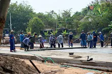 670204 ชาวบ้านราช คุ้มสีเหลือง +ส้ม+ม่วง เทปูนลานสู่สูญ ข้างโคกใต้ดิน 1.jpeg