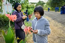 671228 สมุนพระรามเข้าค่าย เรียนการปรับปรุงพันธุ์พุทธรักษา เล่นเกมกินวิบาก พาทัวร์รถราง 29.jpg