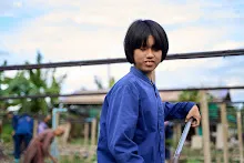 680224 วันบวร ชาวชุมชนสีแดง และ นร.ม.1 ปลูกหัวไชเท้า 35.jpg