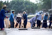 670204 ชาวบ้านราช คุ้มสีเหลือง +ส้ม+ม่วง เทปูนลานสู่สูญ ข้างโคกใต้ดิน 17.jpeg